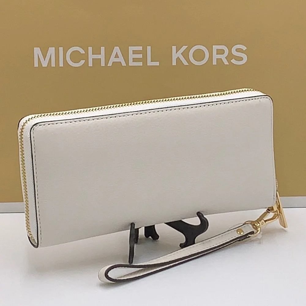 MICHAEL KORS LARGE TRAVEL CONTINENTAL WRISTLET WALLET PHONE OPTIC WHITE COLOR